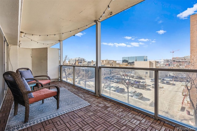 888 N Logan St Unit 5A, Denver, CO 80203 - balcony featuring a view of city