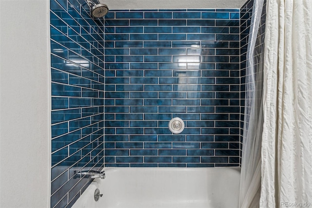 888 N Logan St Unit 5A, Denver, CO 80203 - bathroom featuring shower / bath combo with shower curtain