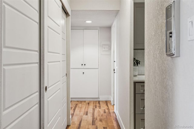888 N Logan St Unit 5A, Denver, CO 80203 - hall featuring light wood-type flooring and recessed lighting
