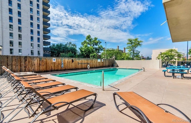888 N Logan St Unit 5A, Denver, CO 80203 - community pool featuring a patio