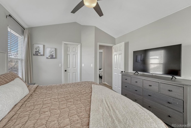 bedroom featuring lofted ceiling and ceiling fan