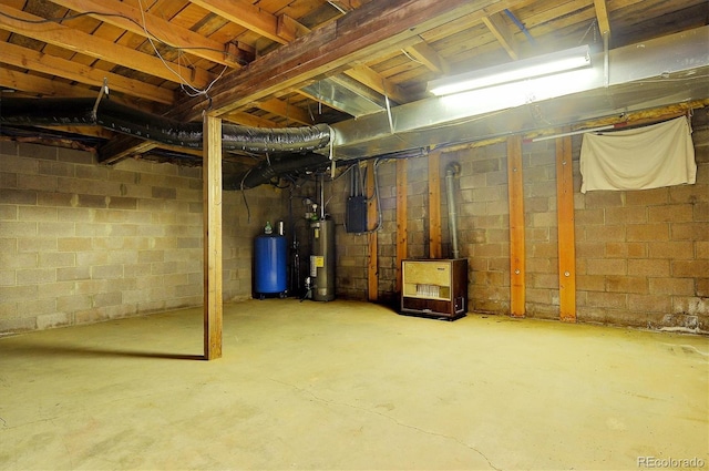 35805 US Highway 24, Buena Vista, CO 81211 - unfinished basement featuring gas water heater and a water pressure tank