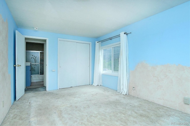 35805 US Highway 24, Buena Vista, CO 81211 - unfurnished bedroom with carpet, a closet, and ensuite bathroom