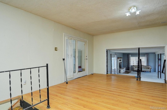 35805 US Highway 24, Buena Vista, CO 81211 - unfurnished room featuring wood finished floors and a textured ceiling