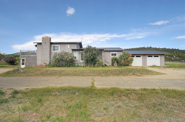 35805 US Highway 24, Buena Vista, CO 81211 - view of front of home featuring driveway and a metal roof