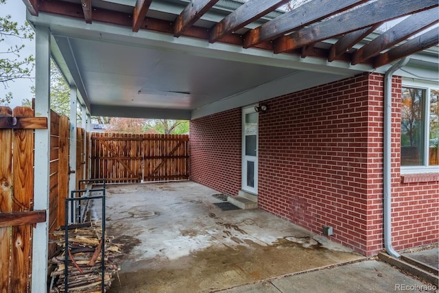 view of patio / terrace featuring fence