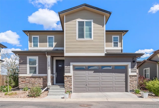 11235 S Neu Towne Cir, Parker, CO 80134 - view of front of property with stone siding, a garage, and driveway
