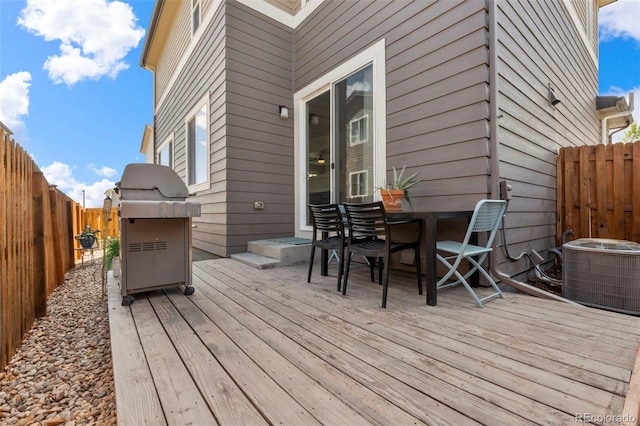11235 S Neu Towne Cir, Parker, CO 80134 - deck featuring central AC, a fenced backyard, and outdoor dining space