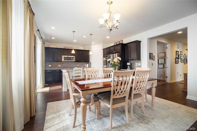 25536 E 1st Ave, Aurora, CO 80018 - dining area with a chandelier, dark wood-style floors, and recessed lighting
