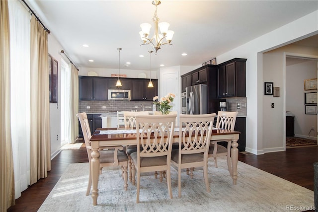25536 E 1st Ave, Aurora, CO 80018 - dining space featuring dark wood-style floors, a chandelier, and recessed lighting