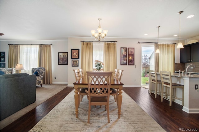 25536 E 1st Ave, Aurora, CO 80018 - dining room with a chandelier, dark wood-style floors, and recessed lighting