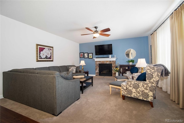25536 E 1st Ave, Aurora, CO 80018 - carpeted living area with ceiling fan and a brick fireplace