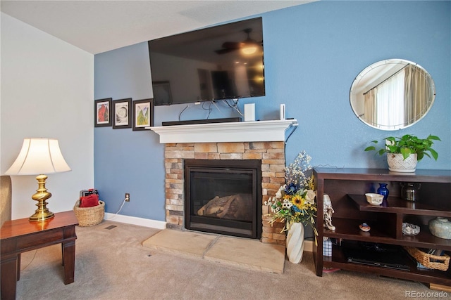 25536 E 1st Ave, Aurora, CO 80018 - living room with a glass covered fireplace and carpet flooring