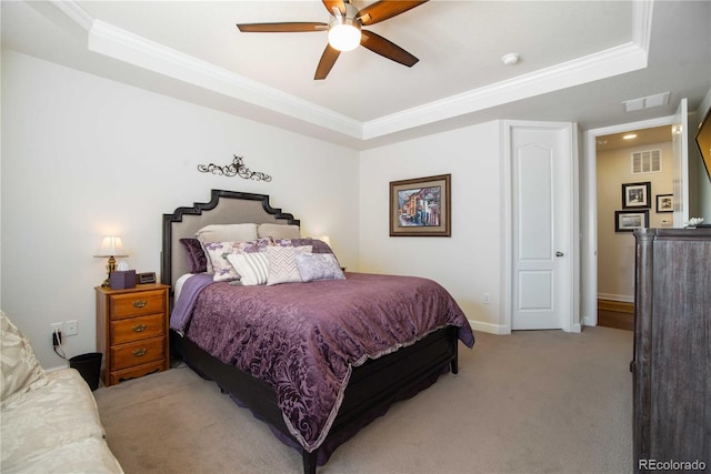 25536 E 1st Ave, Aurora, CO 80018 - bedroom featuring a tray ceiling, ornamental molding, light carpet, and ceiling fan