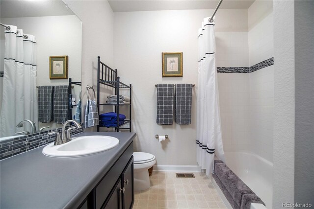 25536 E 1st Ave, Aurora, CO 80018 - bathroom with vanity and shower / tub combo with curtain