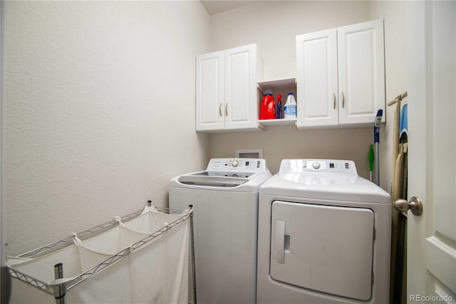 25536 E 1st Ave, Aurora, CO 80018 - laundry area with washer and clothes dryer and cabinet space