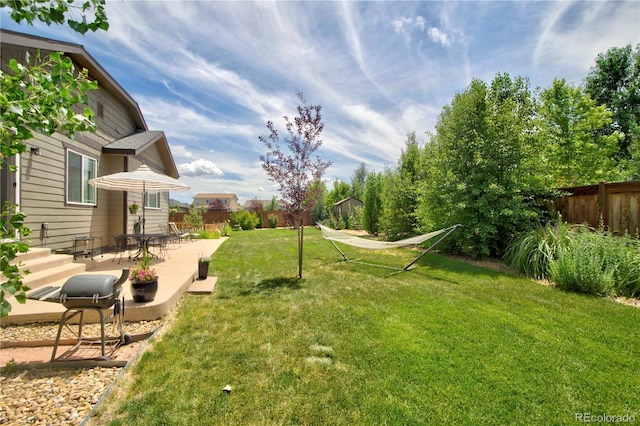 25536 E 1st Ave, Aurora, CO 80018 - view of yard with a patio area