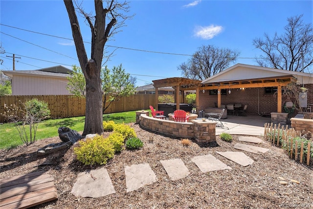 view of yard featuring an outdoor fire pit, a patio, a pergola, and a fenced backyard