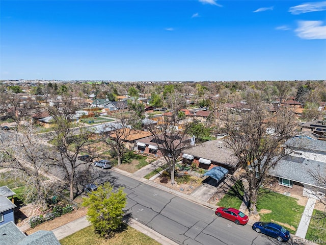 birds eye view of property with a residential view