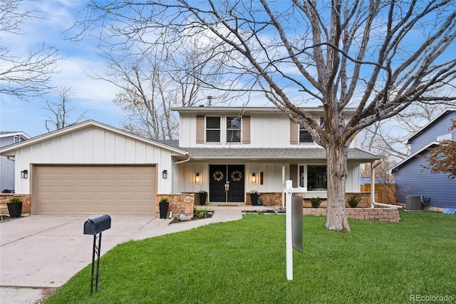 view of front of property with a porch, a front yard, central air condition unit, concrete driveway, and an attached garage