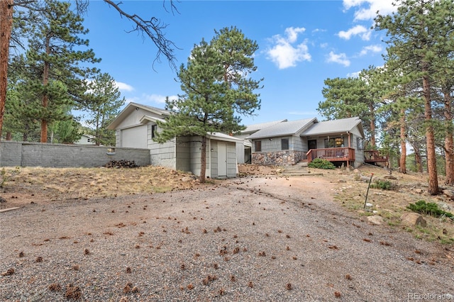 ranch-style home with a deck