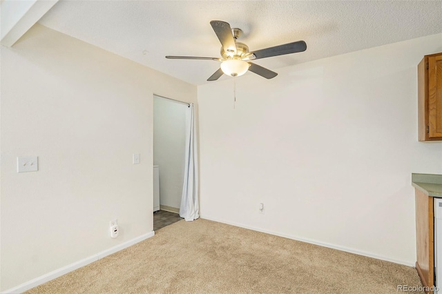 10150 E Virginia Ave Unit 7-302, Denver, CO 80247 - unfurnished room with light colored carpet, ceiling fan, and baseboards