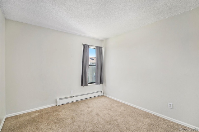10150 E Virginia Ave Unit 7-302, Denver, CO 80247 - carpeted empty room featuring baseboard heating, a textured ceiling, and baseboards
