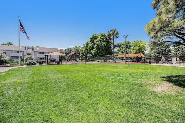 10150 E Virginia Ave Unit 7-302, Denver, CO 80247 - view of green lawn featuring a gazebo and volleyball court