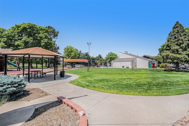 10150 E Virginia Ave Unit 7-302, Denver, CO 80247 - view of community with a lawn and a gazebo