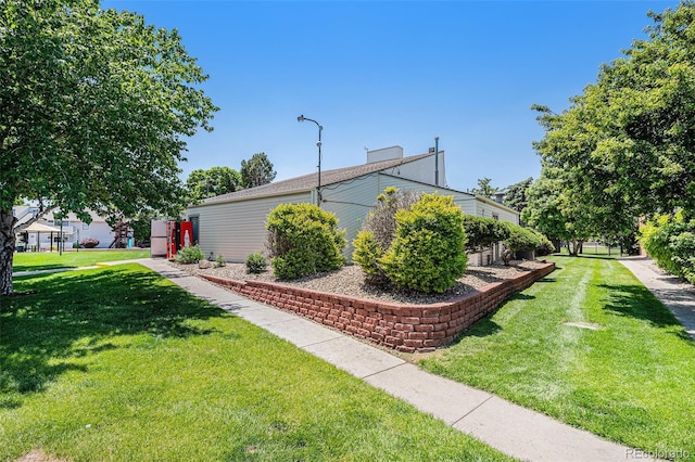 10150 E Virginia Ave Unit 7-302, Denver, CO 80247 - view of grassy yard