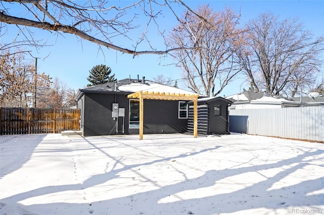 rear view of property featuring a patio