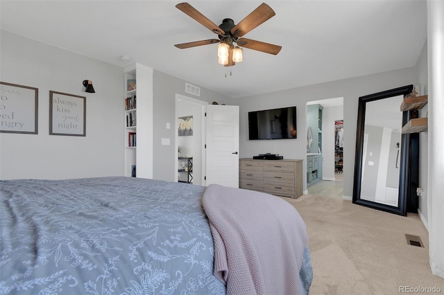 18085 E 107th Pl, Commerce City, CO 80022 - carpeted bedroom featuring a spacious closet, a ceiling fan, baseboards, and a closet