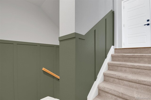18085 E 107th Pl, Commerce City, CO 80022 - stairway with a decorative wall and a wainscoted wall