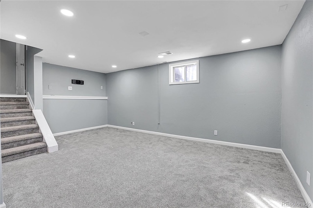 basement featuring carpet flooring