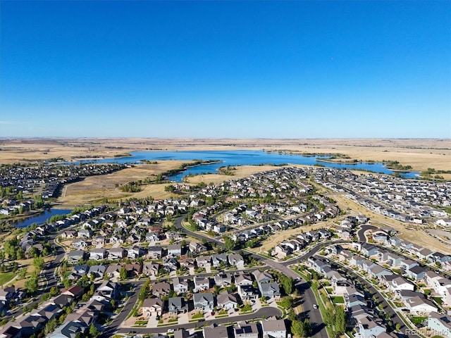 6988 S Riverwood Way, Aurora, CO 80016 - aerial overview of property's location with a large body of water and nearby suburban area