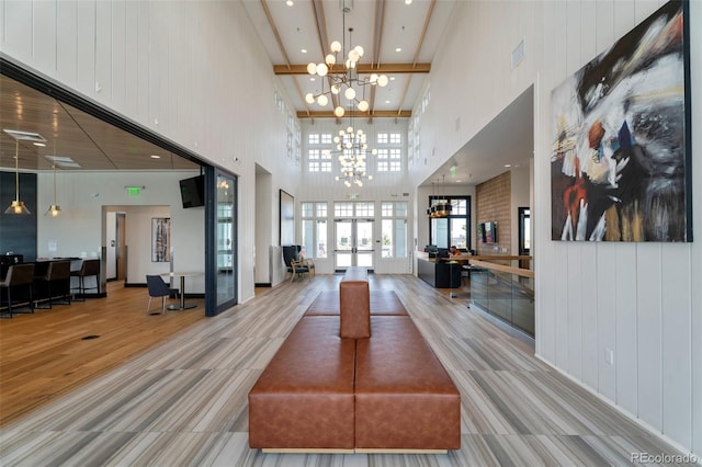 6988 S Riverwood Way, Aurora, CO 80016 - building lobby featuring a towering ceiling and recessed lighting