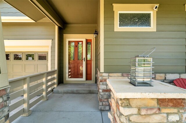 6988 S Riverwood Way, Aurora, CO 80016 - entrance to property featuring a porch