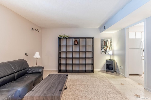 living room with light tile patterned floors