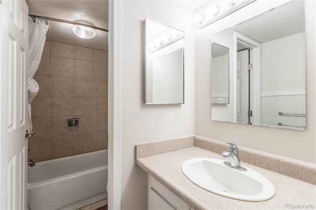 bathroom featuring vanity and shower / bath combo with shower curtain