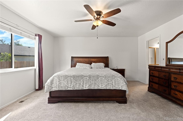 16673 E Kent Dr, Aurora, CO 80013 - bedroom featuring light carpet and ceiling fan