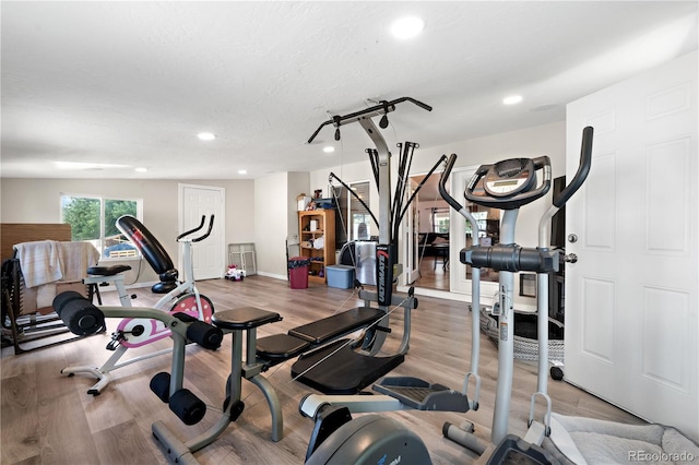 16673 E Kent Dr, Aurora, CO 80013 - exercise room featuring light wood finished floors and recessed lighting