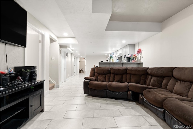 16673 E Kent Dr, Aurora, CO 80013 - living area with light tile patterned floors and recessed lighting