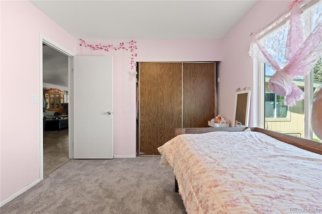 16673 E Kent Dr, Aurora, CO 80013 - bedroom featuring a closet and light carpet