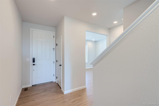 hall featuring light wood-type flooring