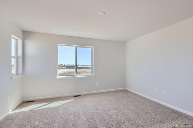 view of carpeted spare room