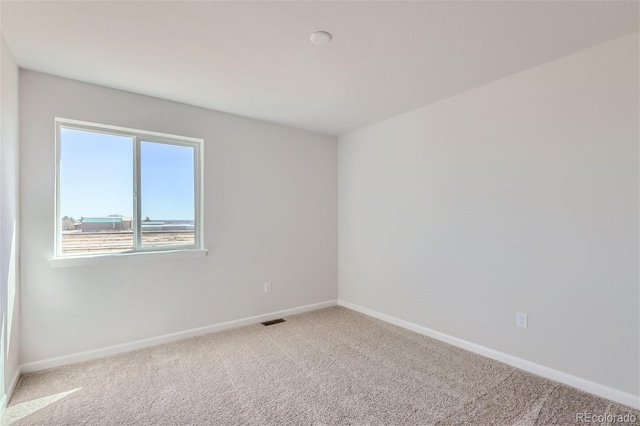 empty room featuring carpet