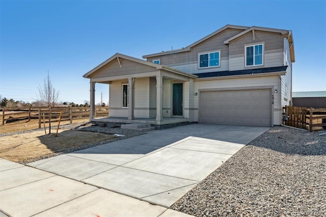 view of front facade featuring driveway, a porch, an attached garage, and fence