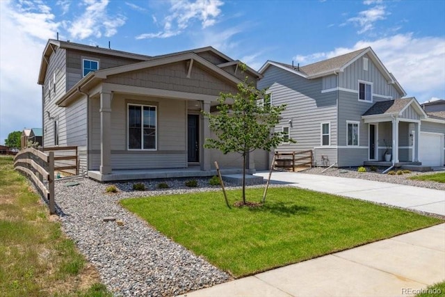5918 Red Barn Ave, Mead, CO 80504 - craftsman inspired home featuring concrete driveway, an attached garage, and board and batten siding