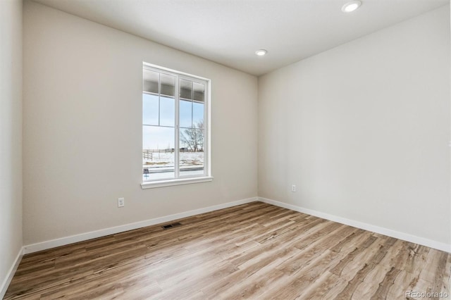 5918 Red Barn Ave, Mead, CO 80504 - unfurnished room featuring wood finished floors and recessed lighting