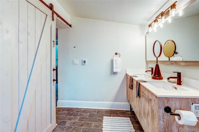 2096 S Logan St, Denver, CO 80210 - full bathroom with double vanity and baseboards
